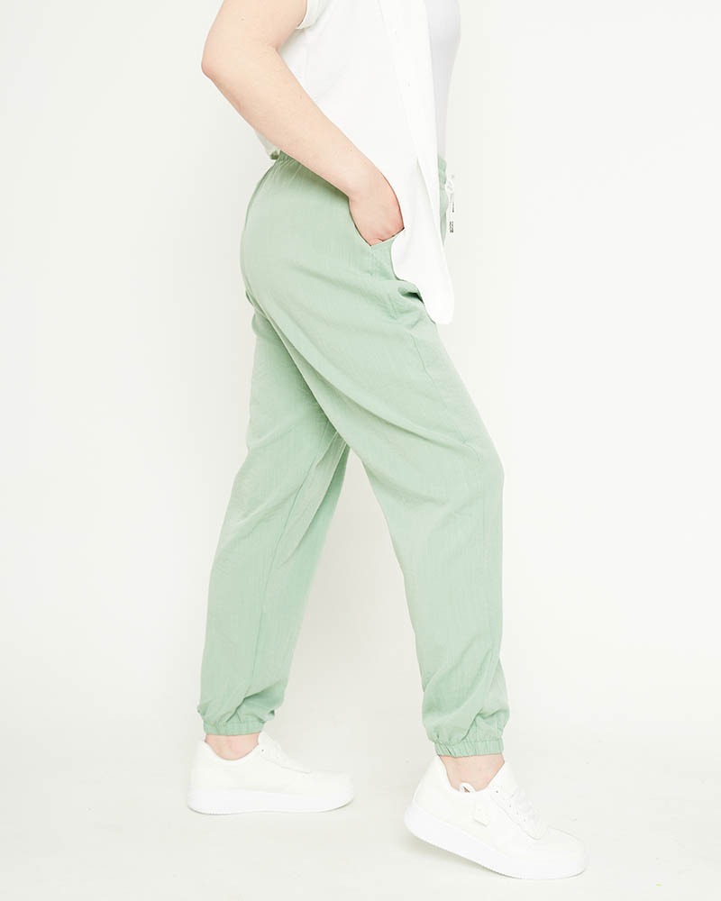 Pantalon femme en tissu vert - Habillement