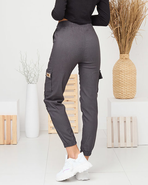 Pantalon de combat isolé gris foncé pour femmes avec lettrage - Vêtements