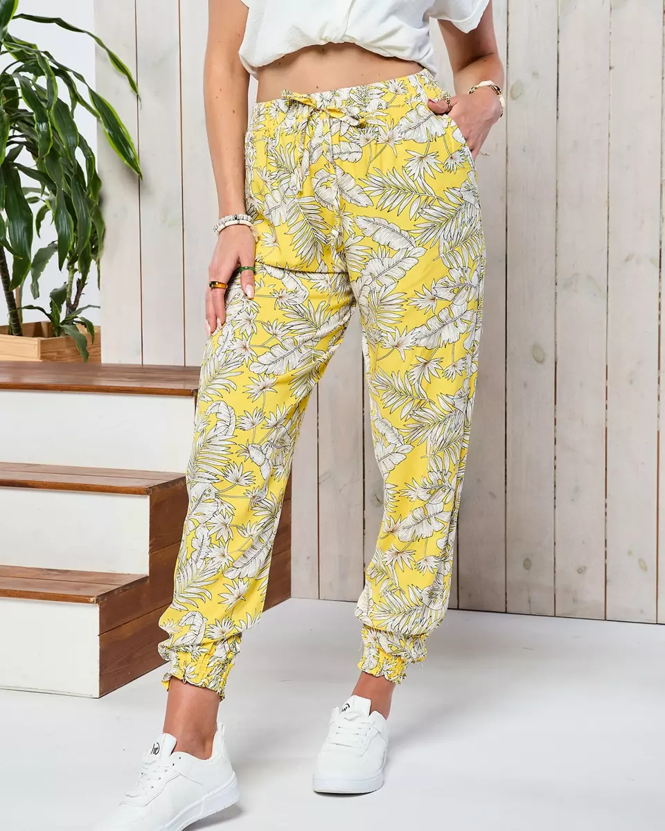 Pantalon en tissu jaune pour femme a'la alladins avec motif floral- Vêtements