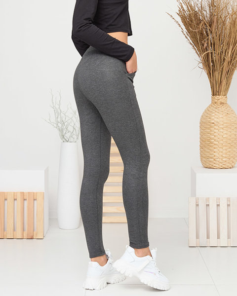 Pantalon teggings gris foncé isolé pour femmes - Vêtements