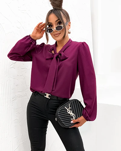 La blouse pour femme Royalfashion avec un nœud
