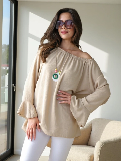 Blouse femme décolleté épaule avec volants