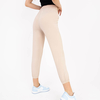 Pantalon femme en tissu beige avec écusson - Vêtements