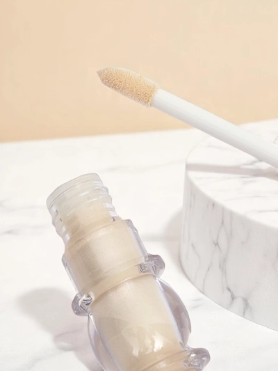 Enlumineur liquide pour le visage avec pinceau Éclat Perlé
