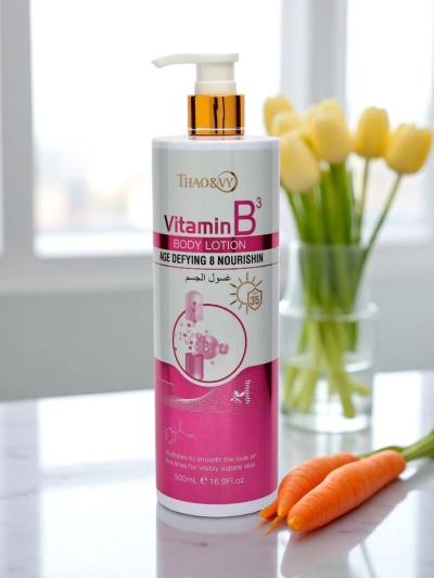 Lait corporel anti-âge et hydratant avec vitamine B3 AgeDefy