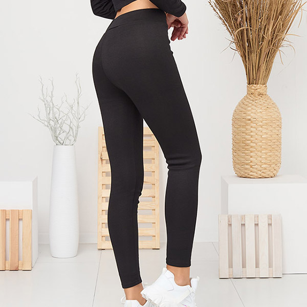 Leggings noirs isolés pour femmes- Vêtements