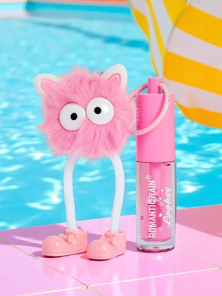 Gloss à lèvres pour enfants avec un monstre duveteux rose foncé