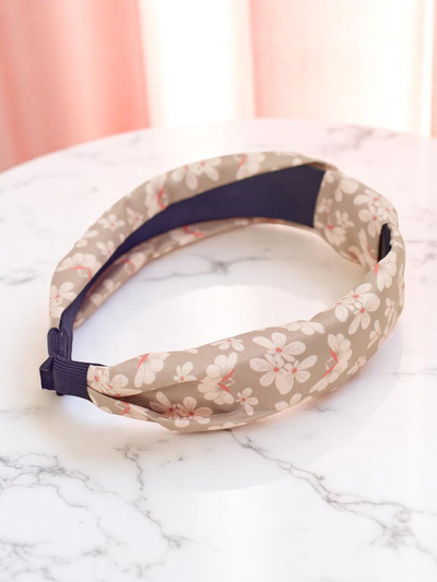 Serre-tête Royalfashion avec motif floral tressé Florinda