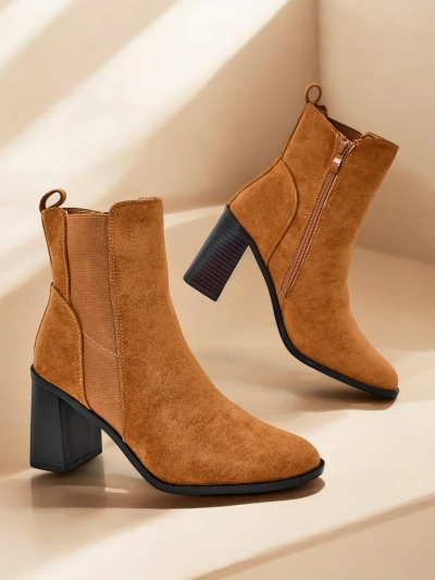 Les bottines pour femme Royalfashion sur un talon épais Enotto