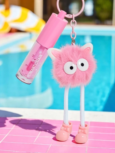 Gloss à lèvres pour enfants avec un monstre duveteux rose foncé
