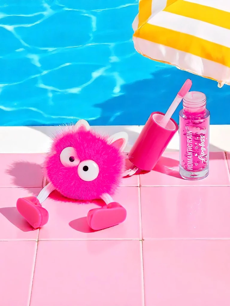 Gloss à lèvres pour enfants avec un monstre duveteux Fuchsia
