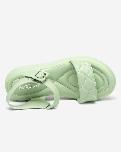 Sandales compensées matelassées en cuir écologique pour femmes en vert Baloui. Chaussures