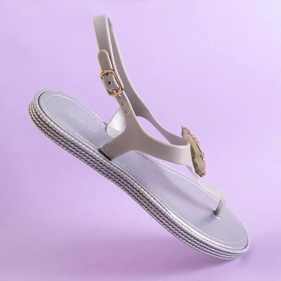 OUTLET Sandales argentées pour femmes a'la tongs avec une fleur de Porto - Chaussures