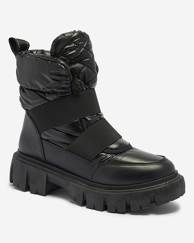 OUTLET Bottes pour femmes a'la bottes de neige sur une semelle plate en noir Ferory- Footwear