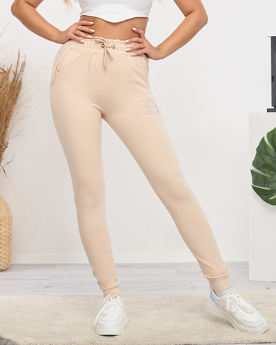 Pantalon de survêtement femme beige clair avec zircons cubiques - Vêtements