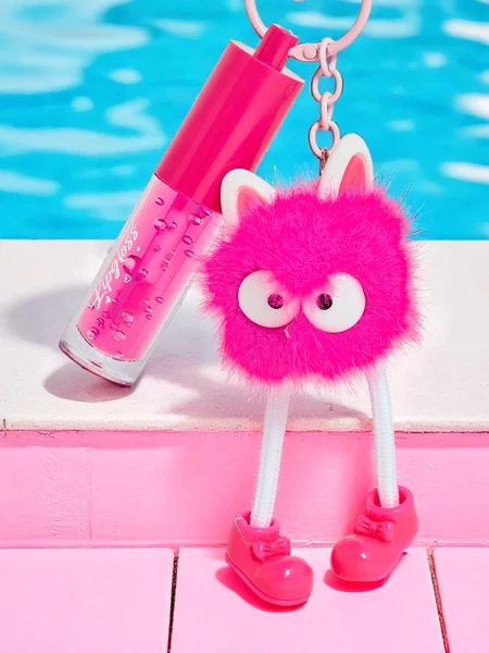 Gloss à lèvres pour enfants avec un monstre duveteux Fuchsia