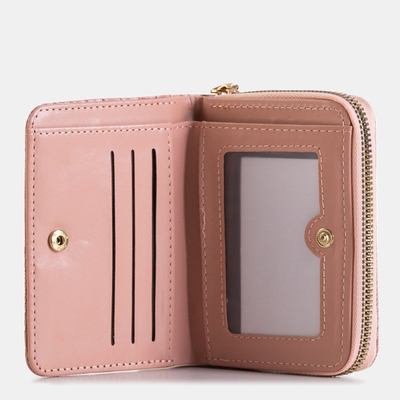 Petit portefeuille rose pour femme avec embossage peau de serpent - Accessoires