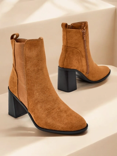 Les bottines pour femme Royalfashion sur un talon épais Enotto