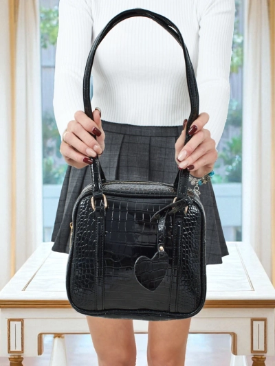 Sac à main Velinne en cuir écologique verni