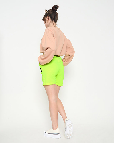 Short femme jaune fluo au-dessus du genou - Habillement