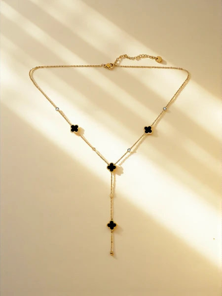Collier Lariat Stella Aurelia plaqué or avec motif d'étoiles