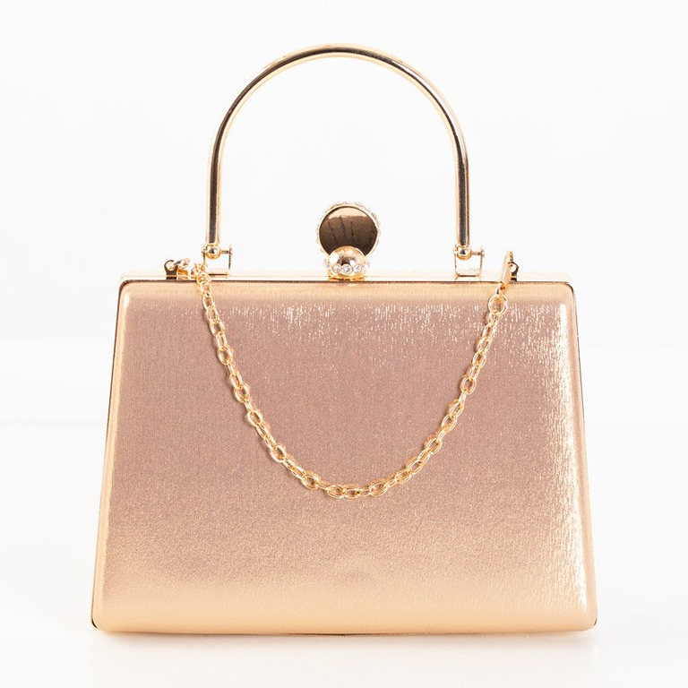 Une petite pochette de couleur or - Sacs à main