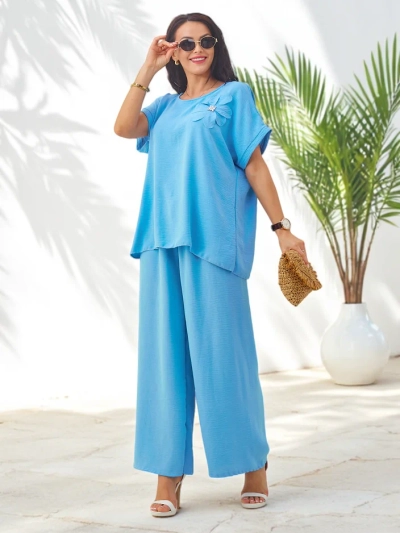 Ensemble Royalfashion pour femmes avec manches courtes, fleur décorative et pantalon large