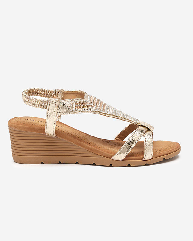 OUTLET Sandales dorées pour femme avec zircons cubiques sur le talon compensé Amuni - Chaussures