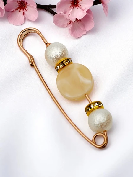 Broche décorative pour femme avec une boucle et des perles Boucle de perle