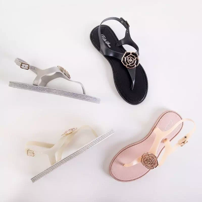 OUTLET Sandales blanches pour femme a'la tongs avec une fleur de Porto - Chaussures