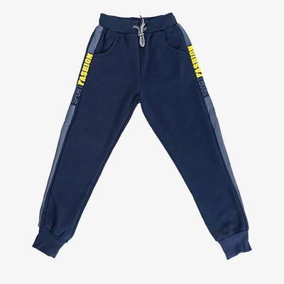 Pantalon de survêtement isolé bleu marine avec inscriptions pour garçon - Pantalon