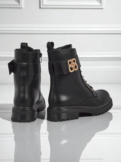 Bottines en cuir Artemisia Nero à bout rond avec fermeture éclair et boucle dorée