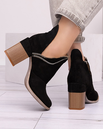 Bottes noires isolées pour femmes sur le poteau Mukis - Chaussures