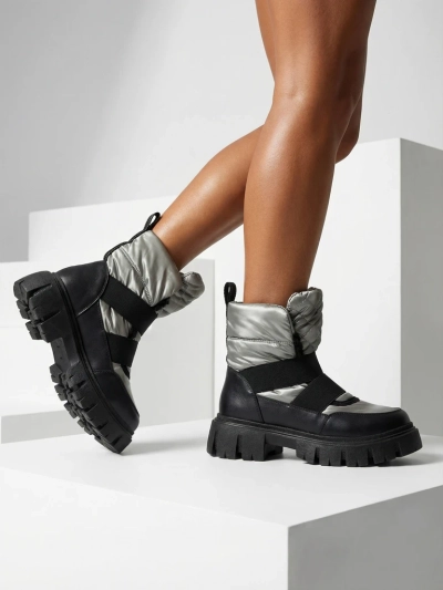 Bottes de neige pour femmes à semelle plate en noir-gris Ferory- Footwear