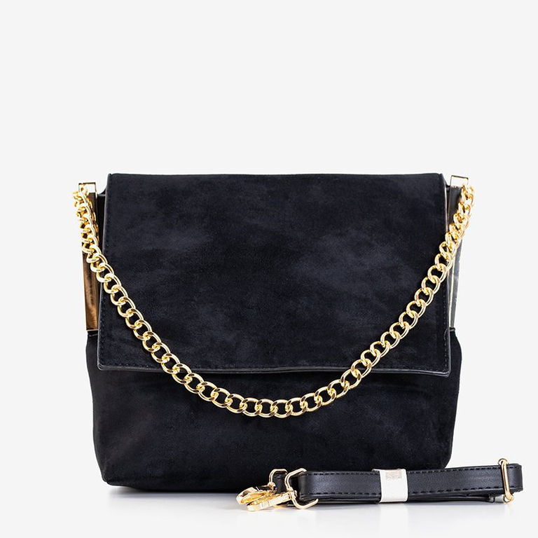 Un petit sac à main noir sur une chaîne - Sacs à main