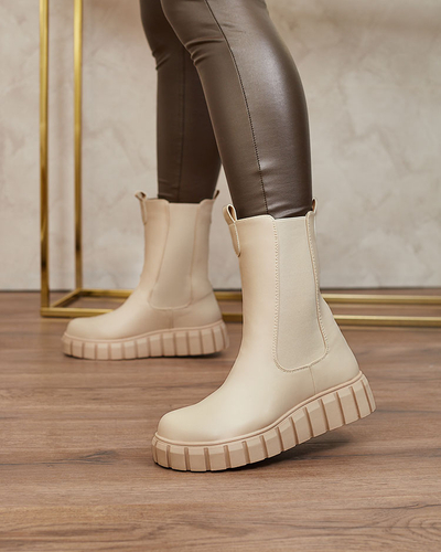 Royalfashion Bottes hautes à talon plat pour femmes en écru Elicane