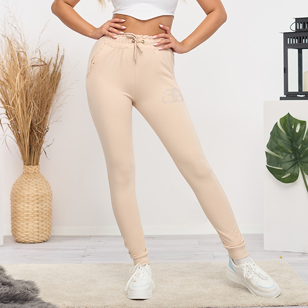 Pantalon de survêtement femme beige clair avec zircons cubiques - Vêtements