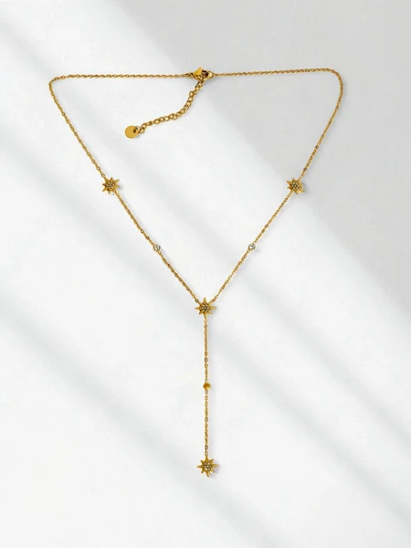 Collier Lariat Stella Aurelia plaqué or avec motif d'étoiles