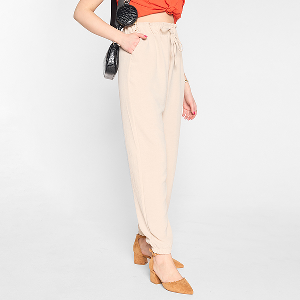 Pantalon en tissu pour femme de couleur beige GRANDE TAILLE - Vêtements