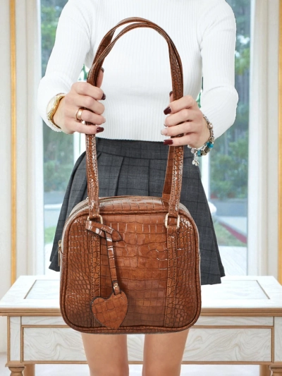 Sac à main Velinne en cuir écologique verni