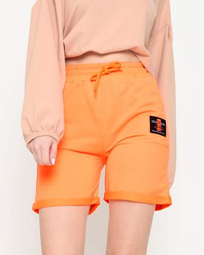 Short femme orange fluo au-dessus du genou - Habillement
