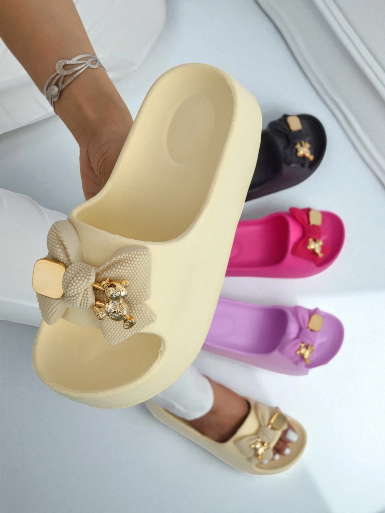 Royalfashion Tongs en caoutchouc pour femmes avec nœud décoratif Alday