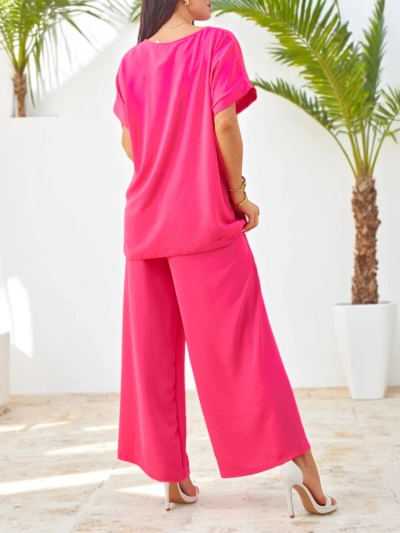 Ensemble Royalfashion pour femmes avec des manches courtes, fleur décorative et pantalon large