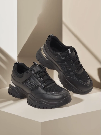 Baskets pour femmes Arete Nero à semelle plate en cuir écologique
