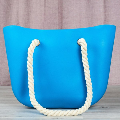 Sac en caoutchouc bleu avec poignées - Sacs à main 1
