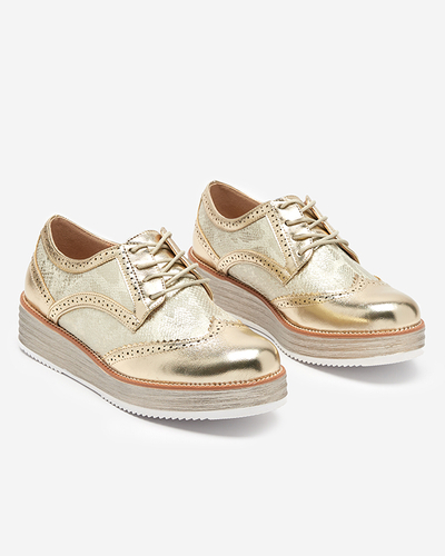 OUTLET Chaussures femme dorées avec empiècements en peau de serpent Fin - Footwear