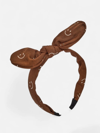 Royalfashion Bandeau pour enfants avec un nœud orné d'un imprimé de visages souriants