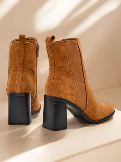 Les bottines pour femme Royalfashion sur un talon épais Enotto