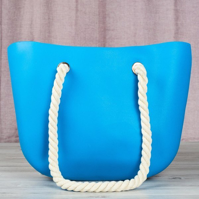 Sac en caoutchouc bleu avec poignées - Sacs à main 1