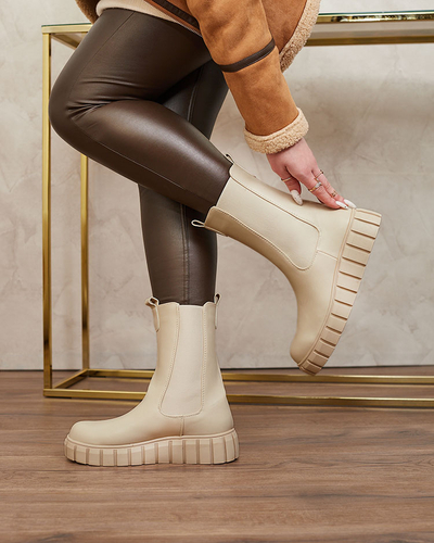 Royalfashion Bottes hautes à talon plat pour femmes en écru Elicane